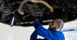 https://www.pexels.com/photo/a-mechanic-working-on-an-undercarriage-of-a-car-8986101/